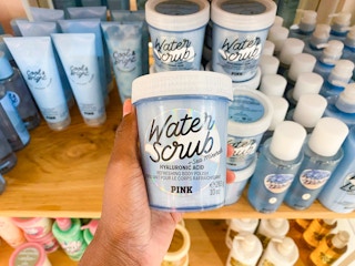 hand holding body care item