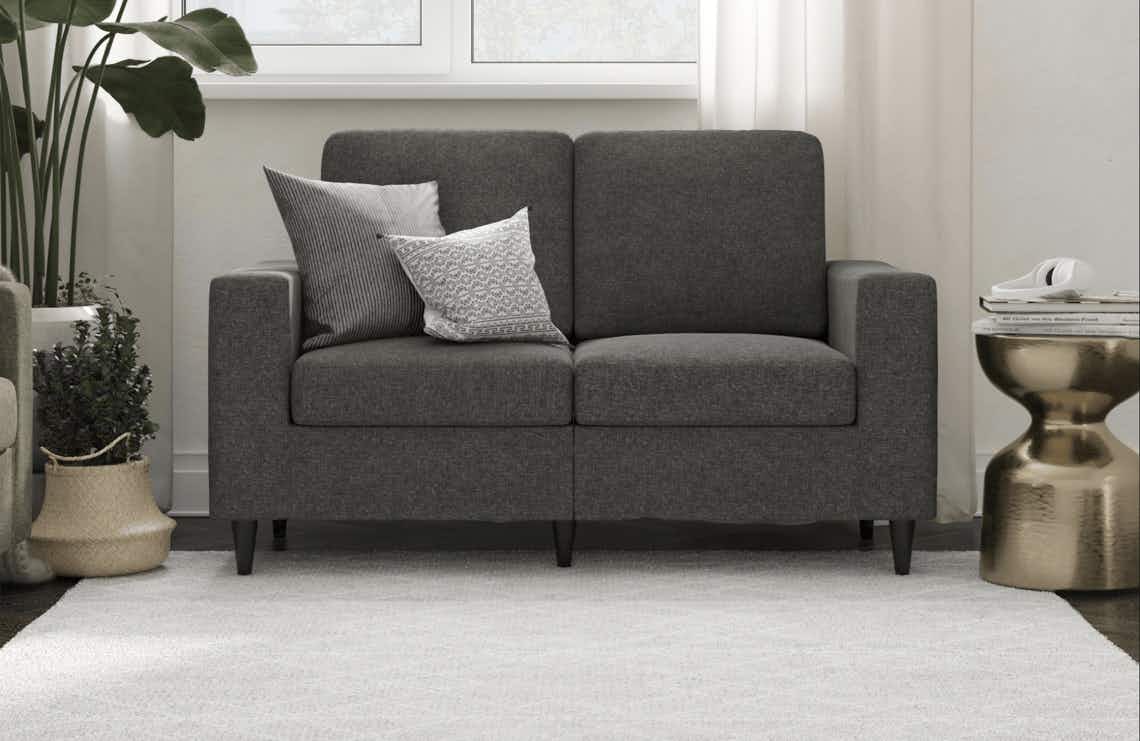 stock photo of dhp loveseat staged in room