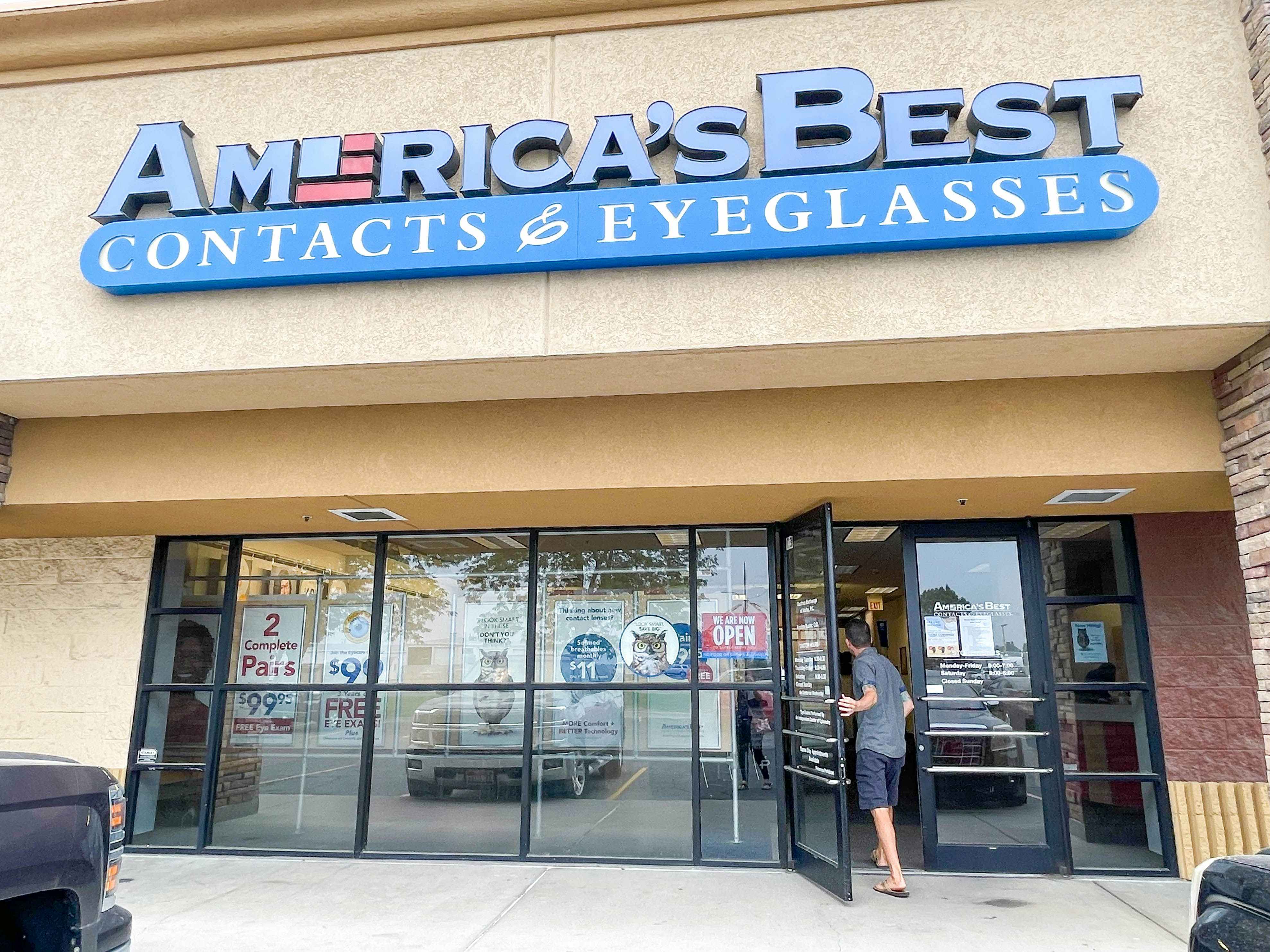 man walking into americas best eye center store 