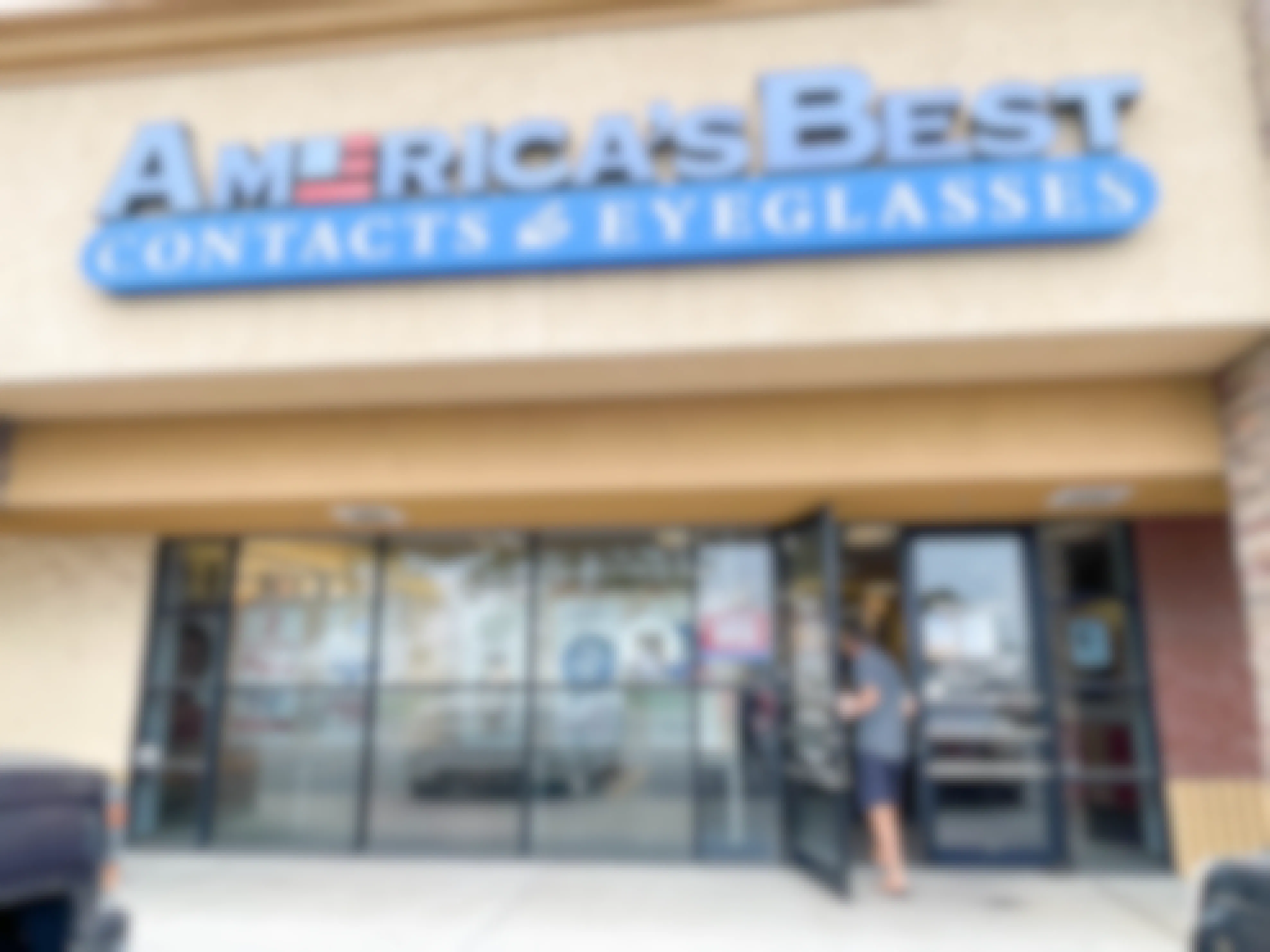 man walking into americas best eye center store 