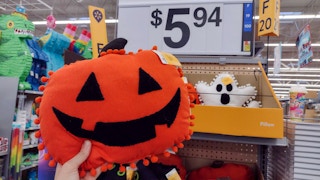 way to celebrate harvest jack o lantern pillow with price sign in background