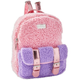 stock photo of justice mini backpack on white background