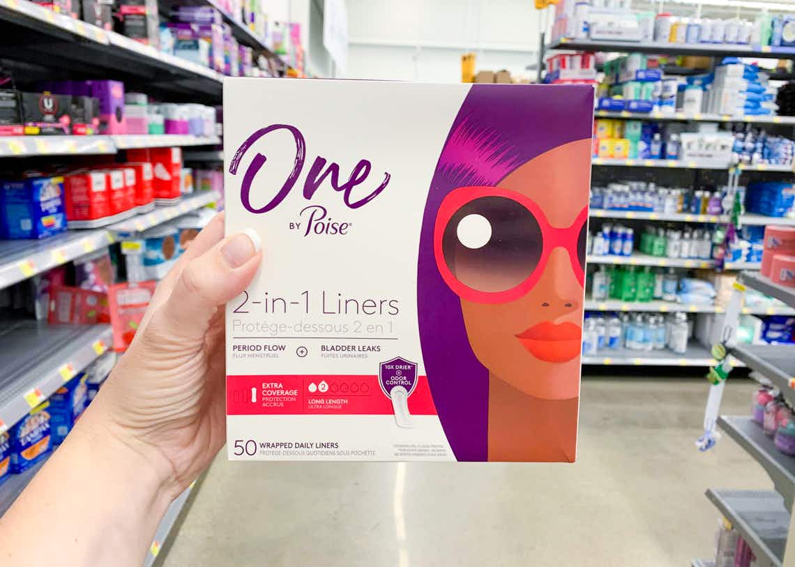 box of one by poise liners held up in aisle