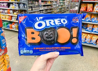 oreo spooky halloween cookies held up in store