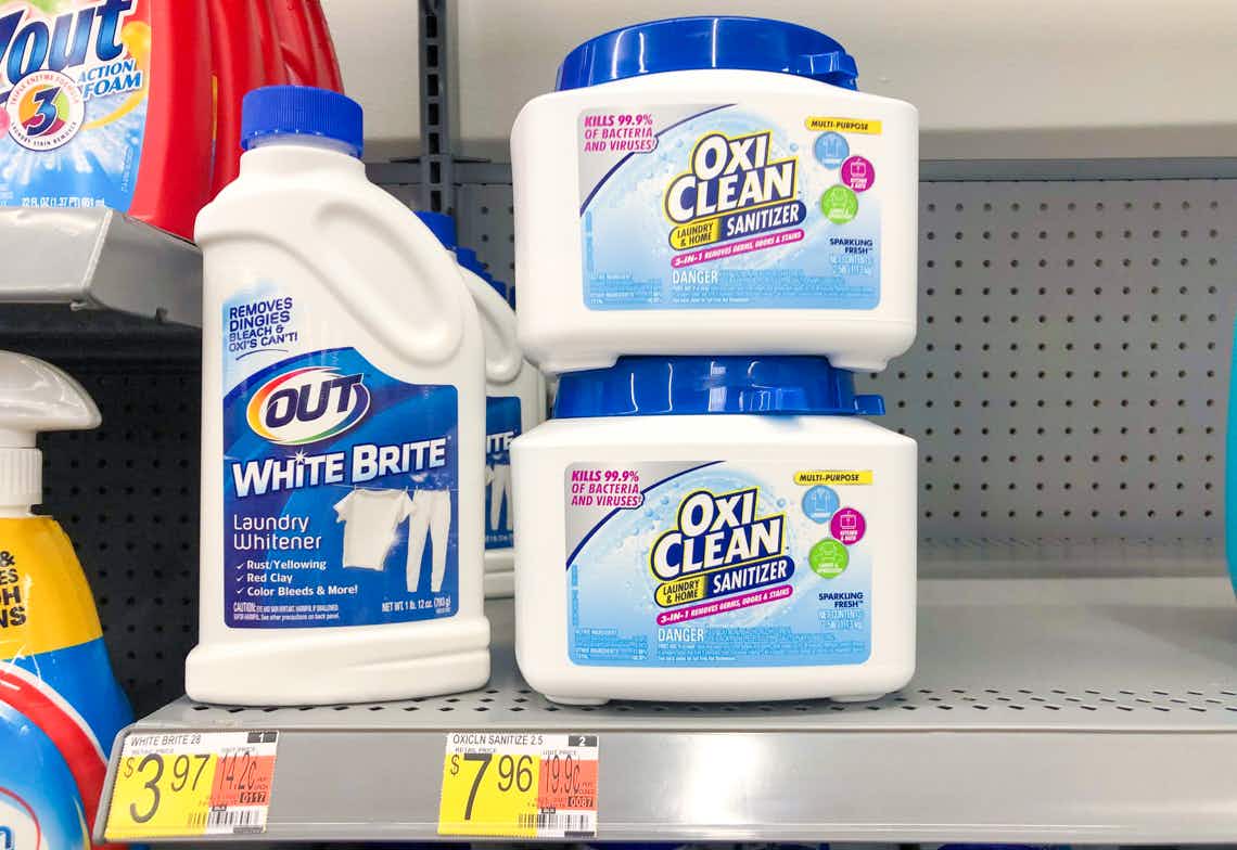two canisters of oxi-clean laundry and home sanitizer on walmart shelf