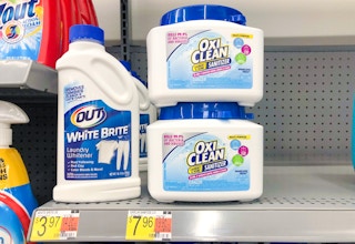two canisters of oxi-clean laundry and home sanitizer on walmart shelf