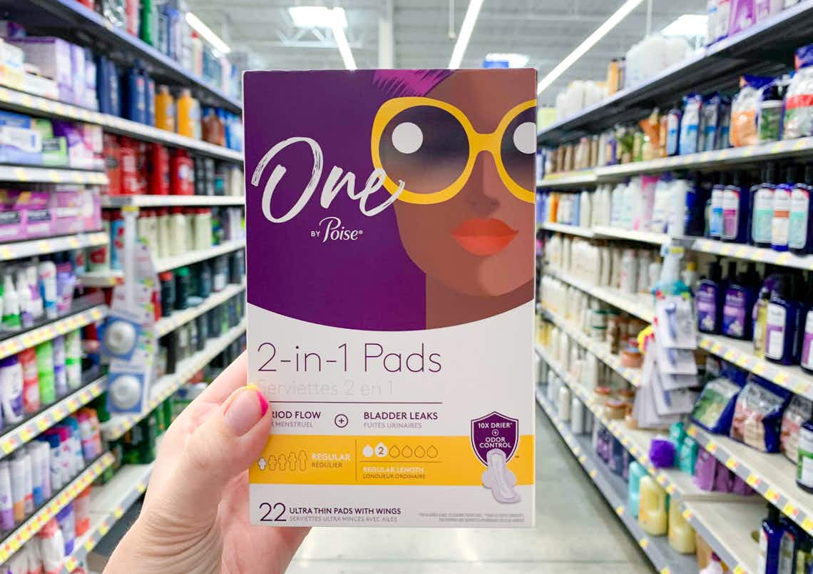 one by poise regular pads held in center of walmart aisle