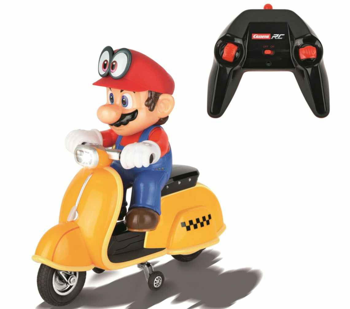 stock photo of remote control super mario scooter and remote on white background