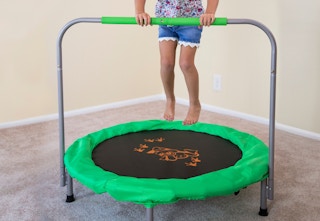 stock photo of skywalker bouncer trampoline staged in room