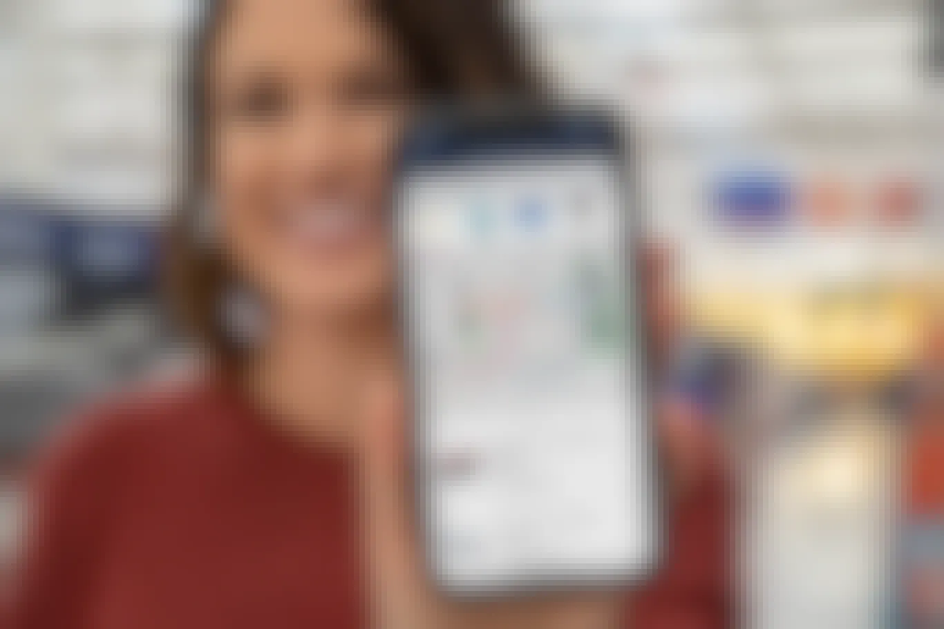 woman holding Walmart store map on phone