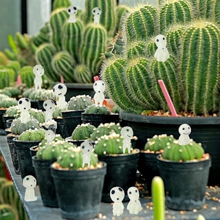 A set of tiny ghost tree elves placed on cacti outside.