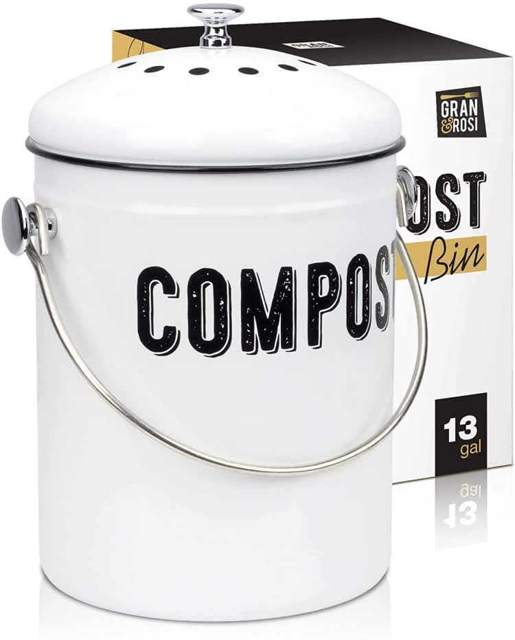 A white metal indoor compost bin.