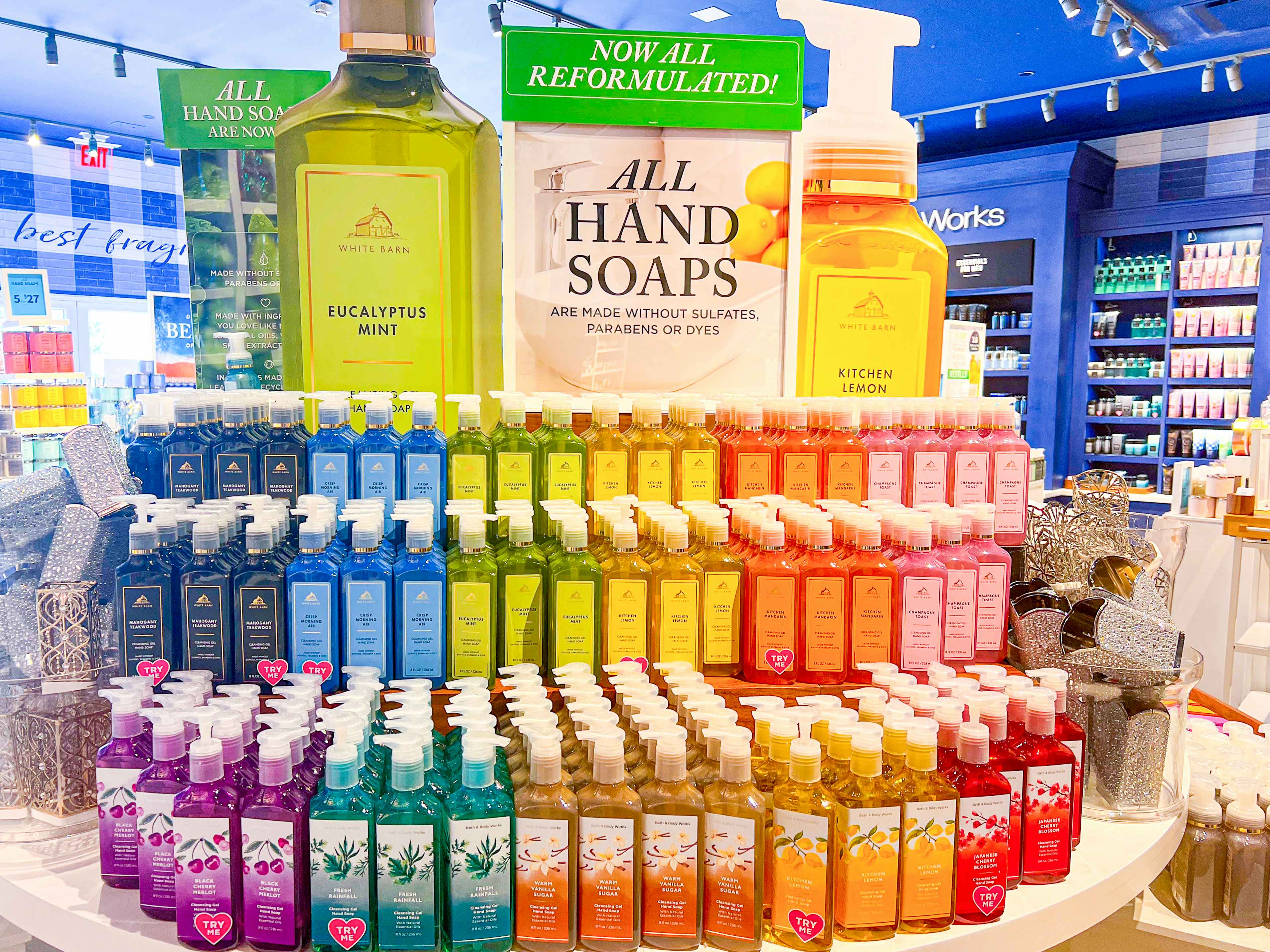 a shelf stocked with different scented hand soaps at Bath & Body Works