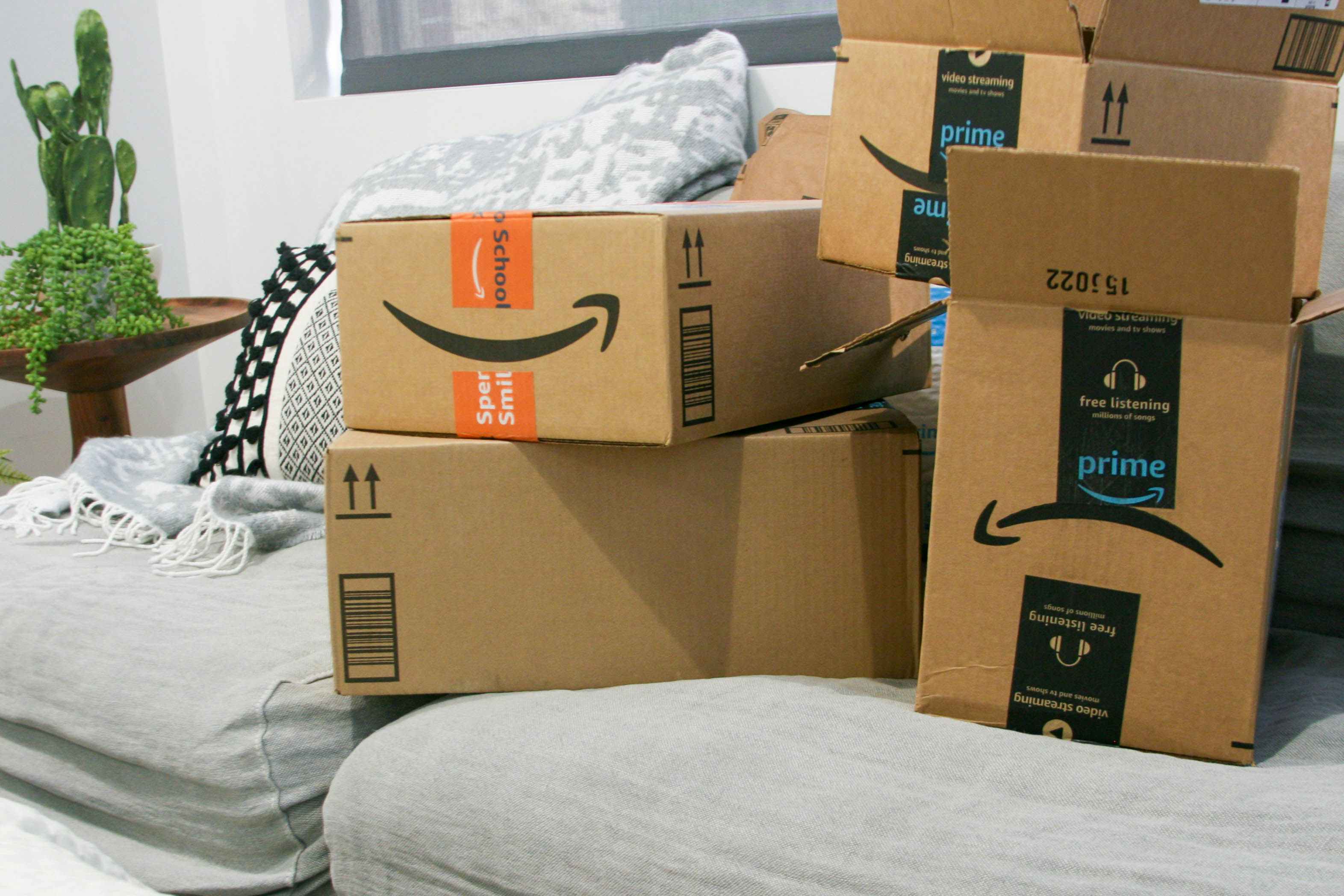 Amazon boxes on couch