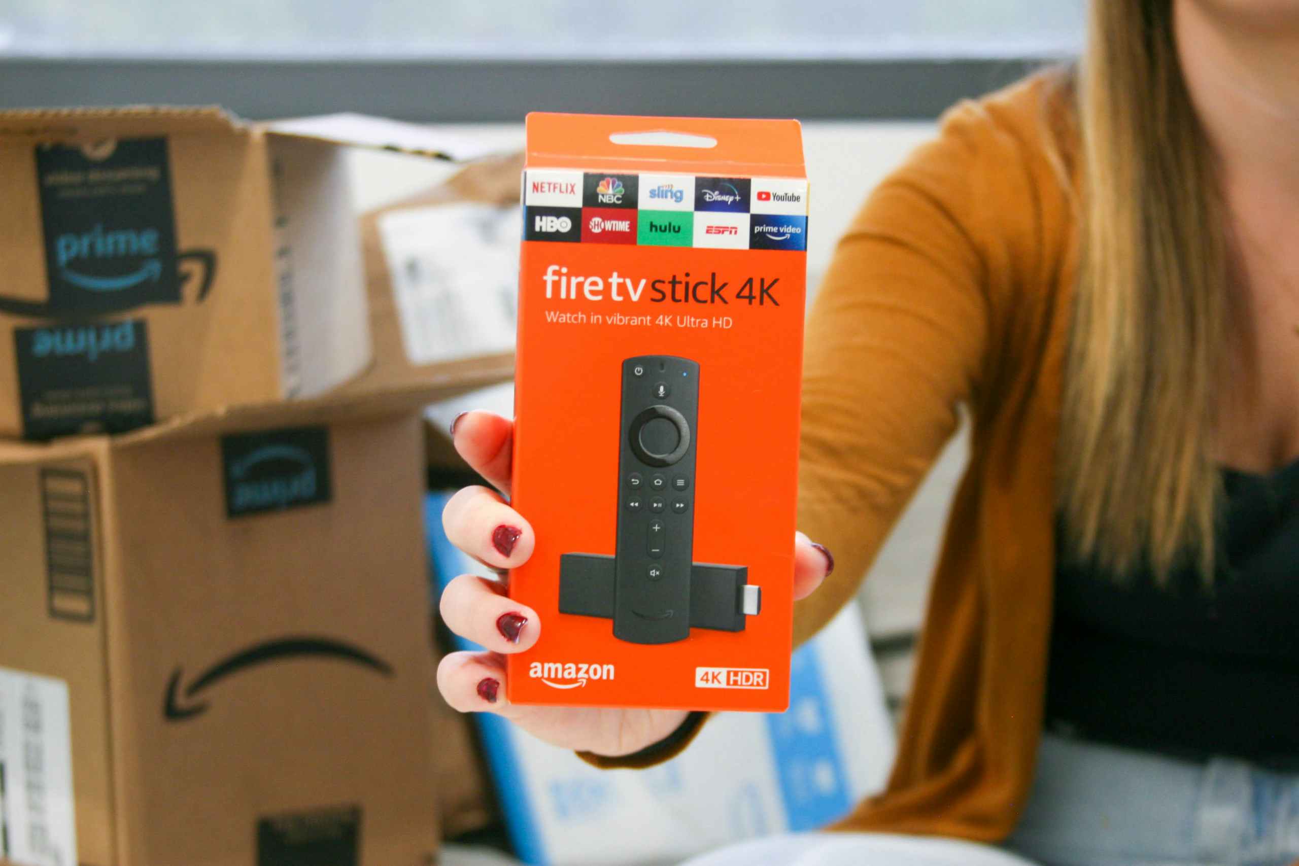 fire tv stick 4k being held