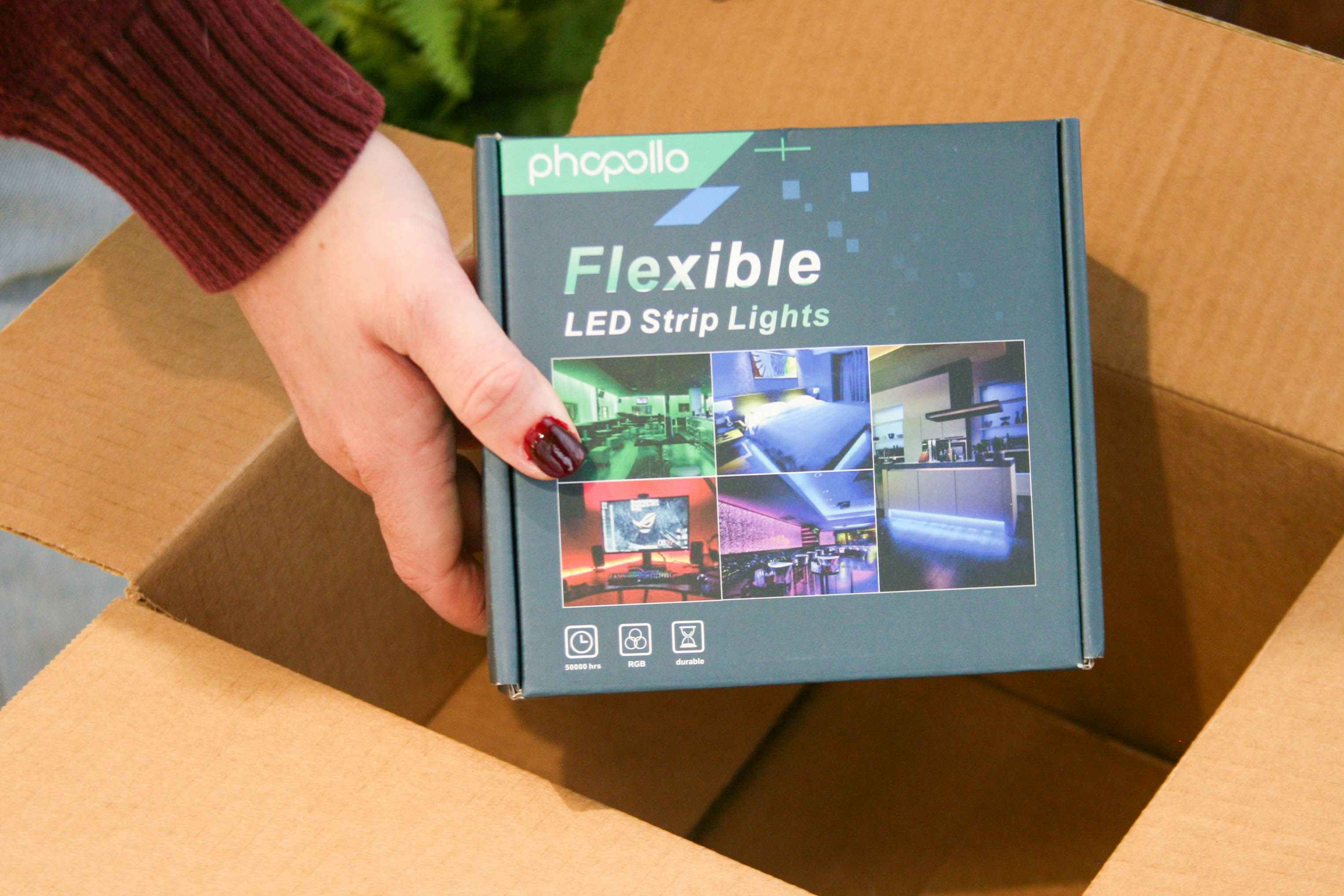 flexible led strip lights being held out of box