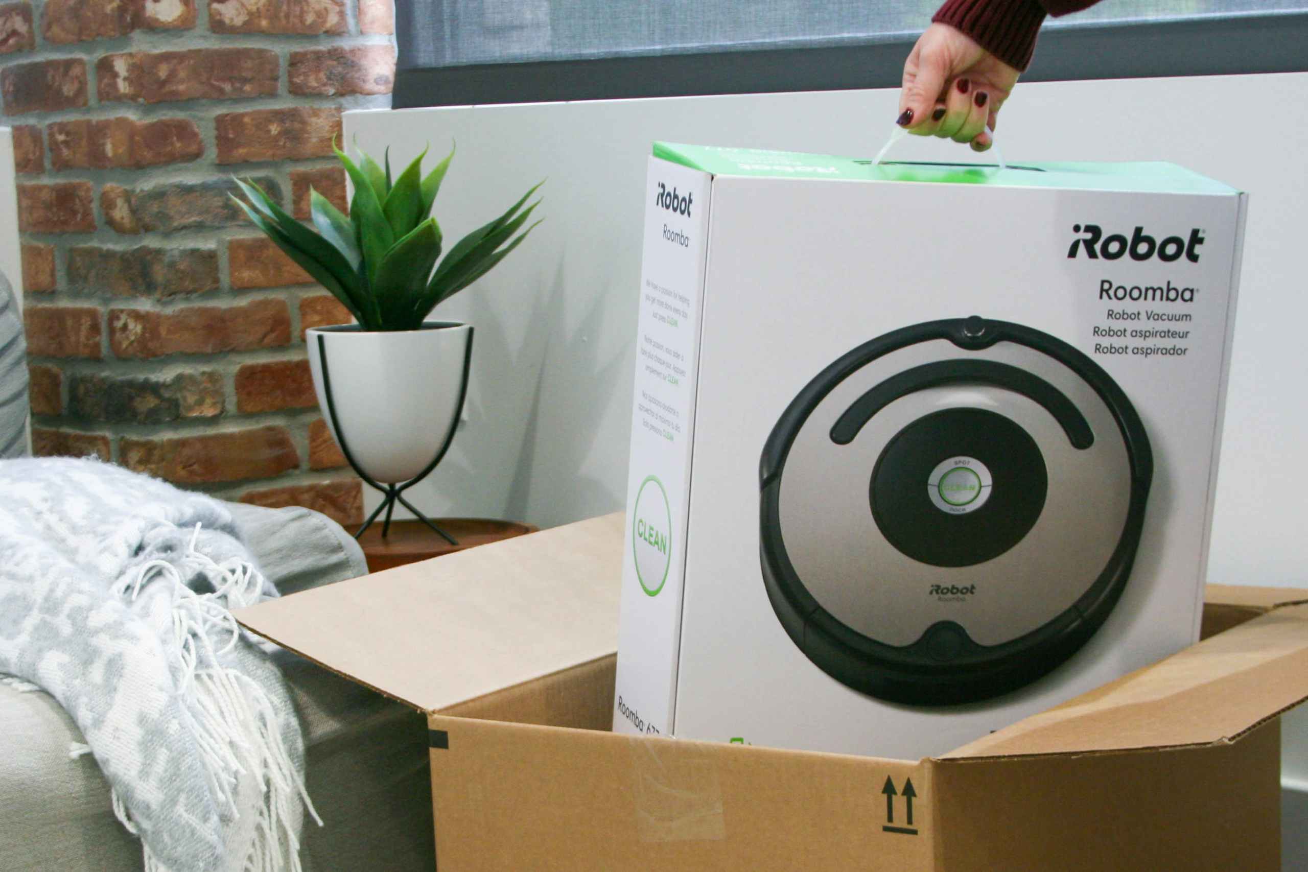 robot roomba coming out of box
