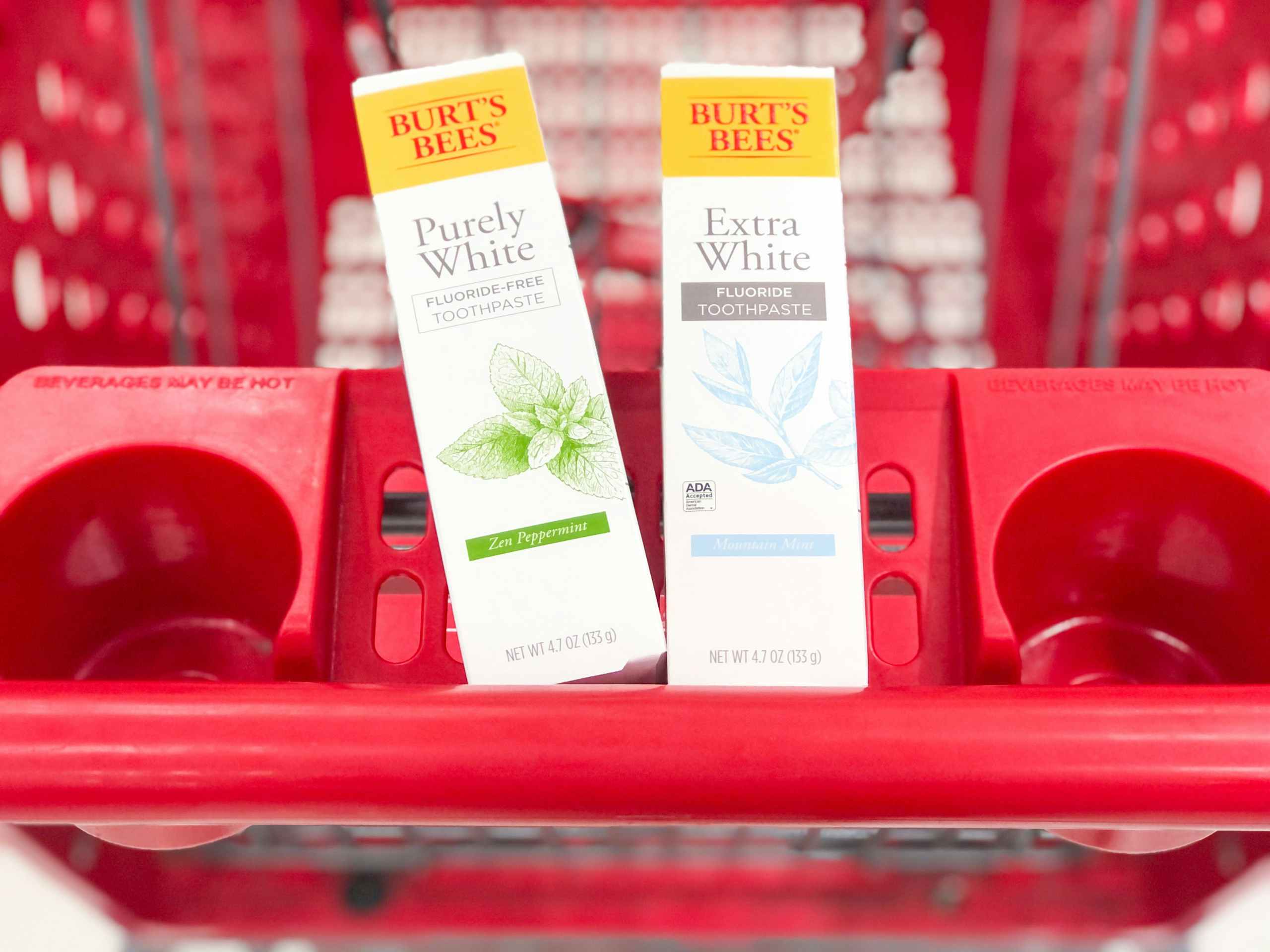 two boxes of Burt's Bees toothpaste in Target shopping cart