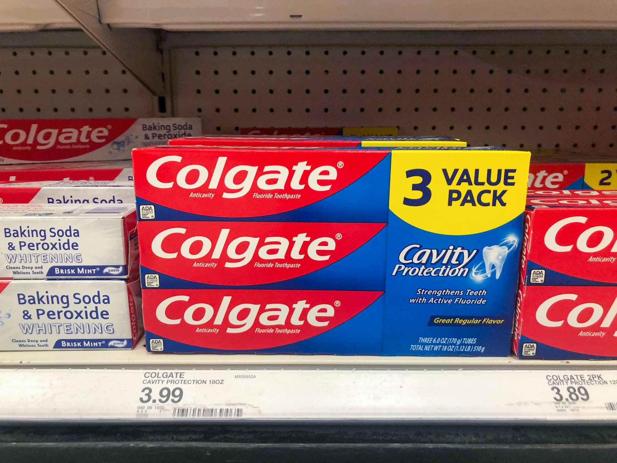 colgate cavity protection toothpaste 3 pack on a target shelf