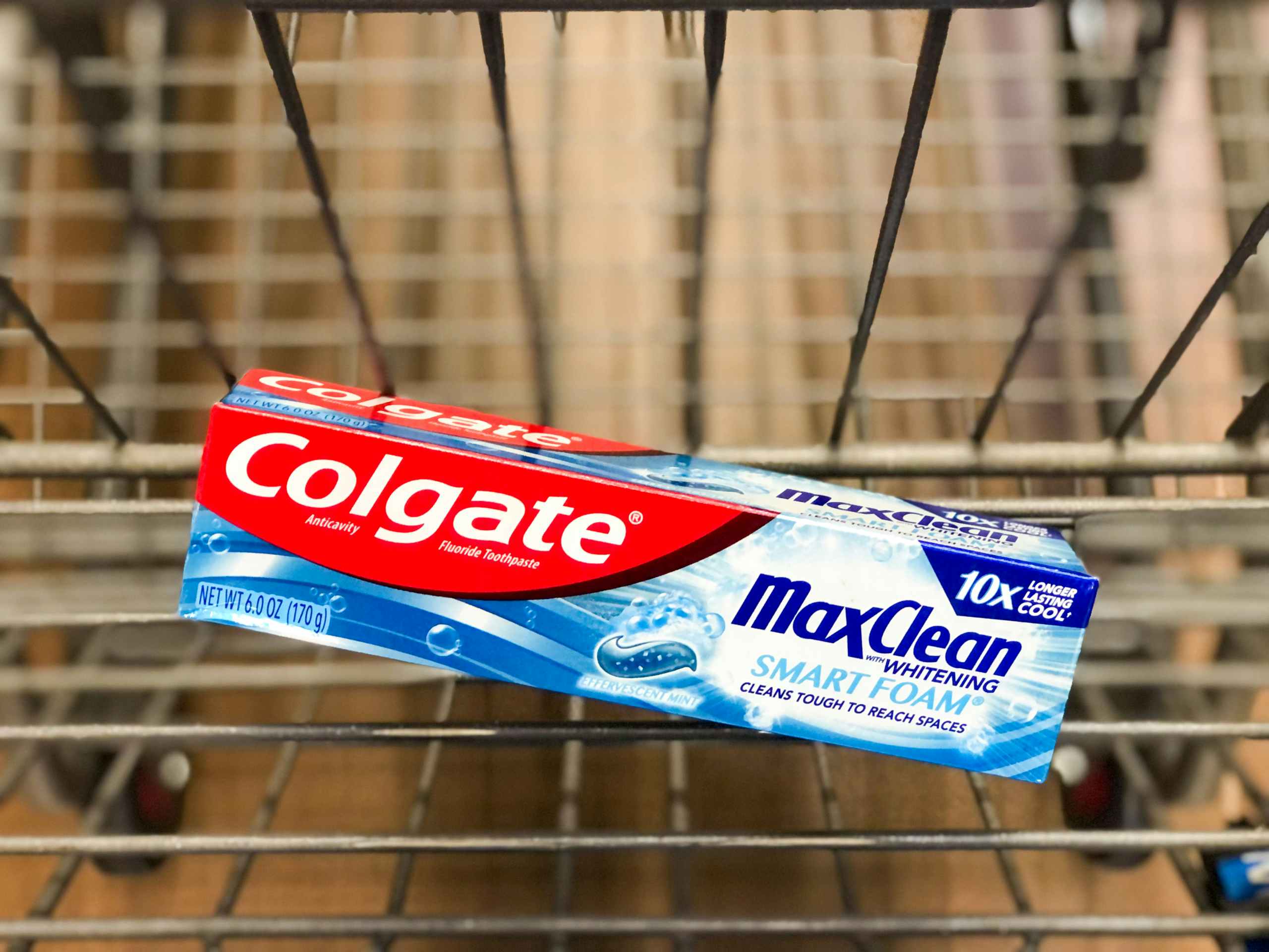 Colgate toothpaste in store shopping Cart