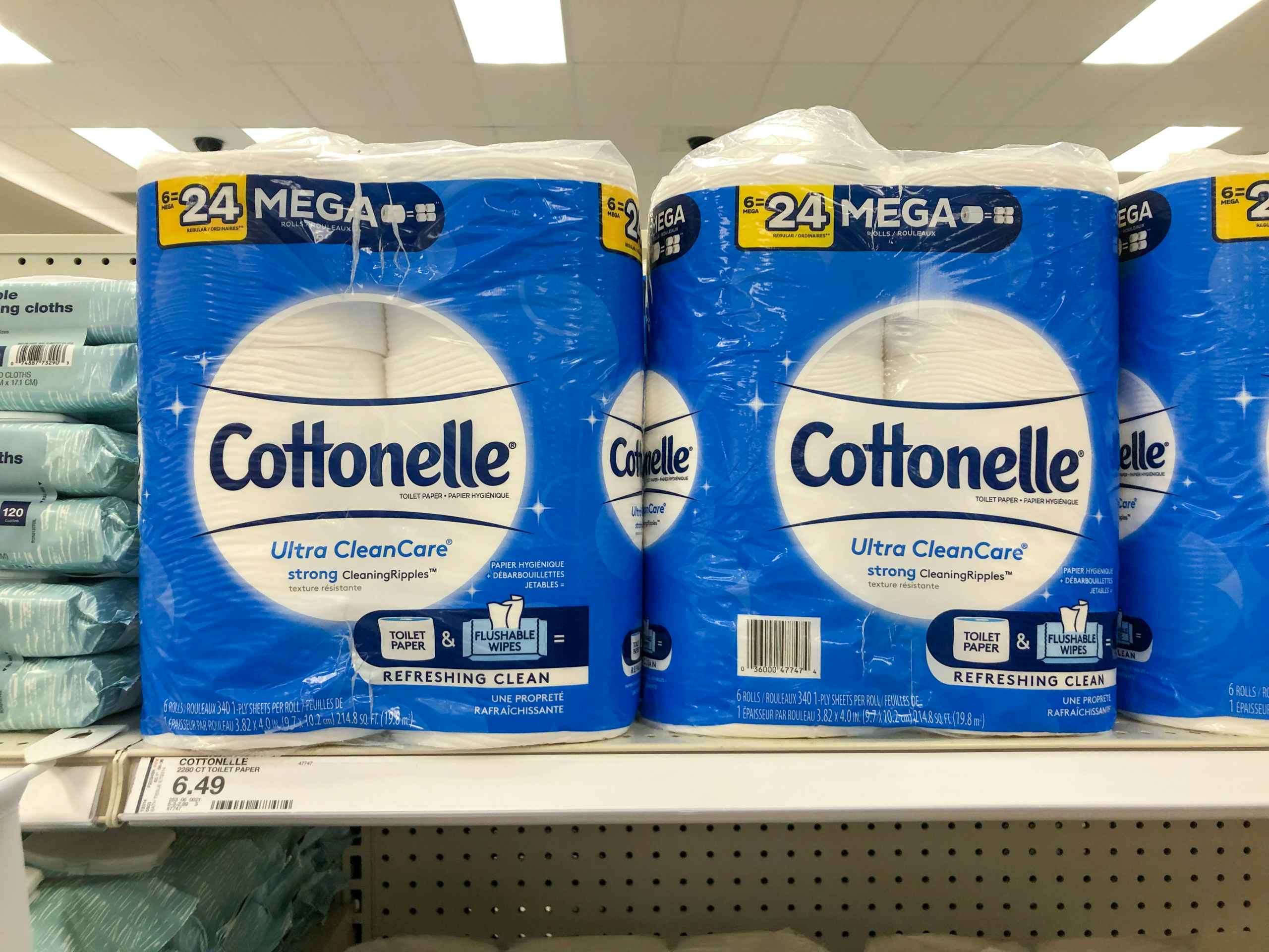 toilet paper packages on store shelf