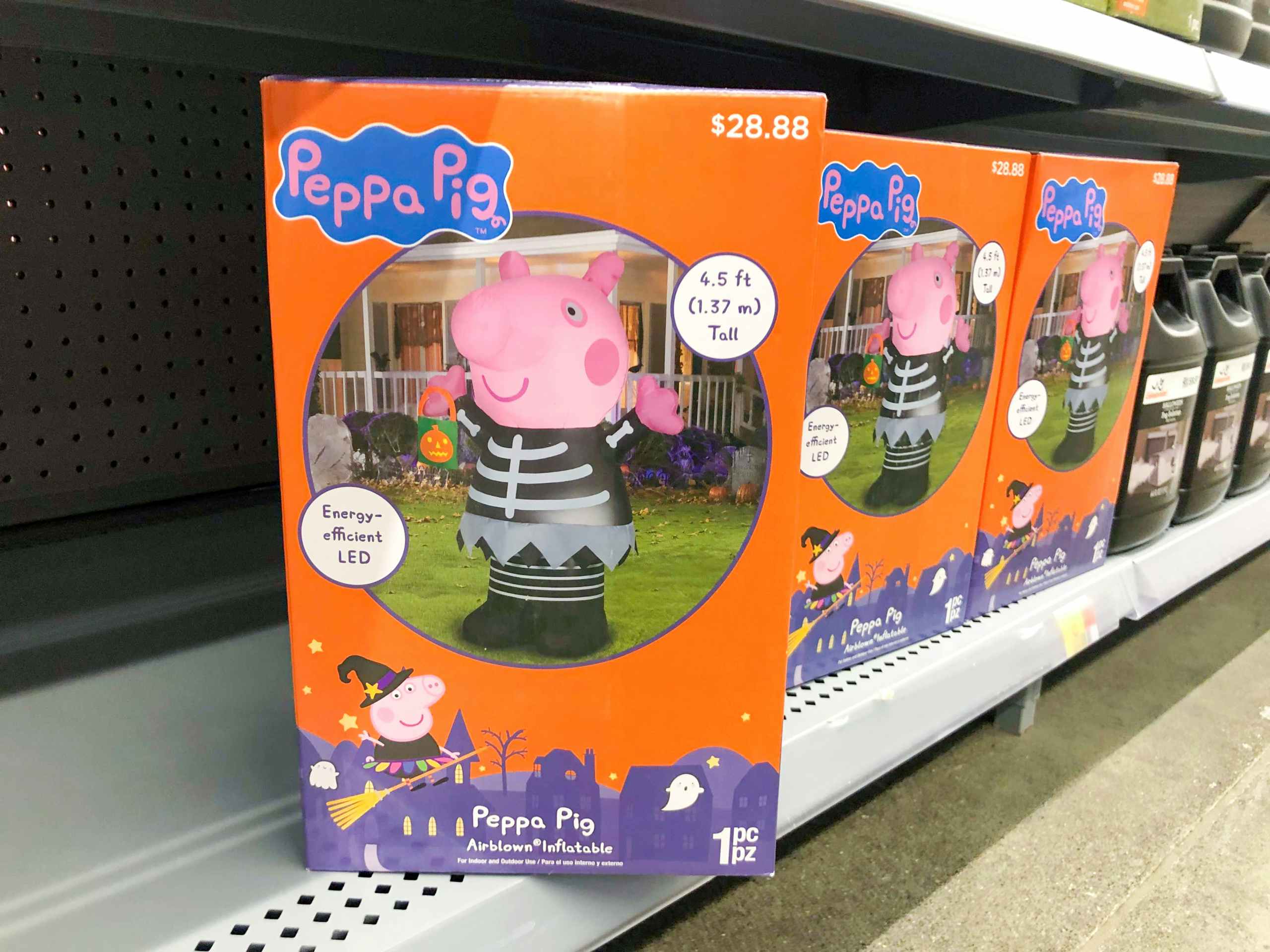 Peppa Pig inflatable halloween decor in boxes on Walmart shelf