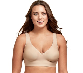 A woman wearing a nude Hanes wirefree bra.