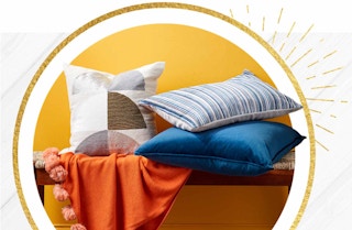 HomeGoods.com shopping image of pillows and blankets