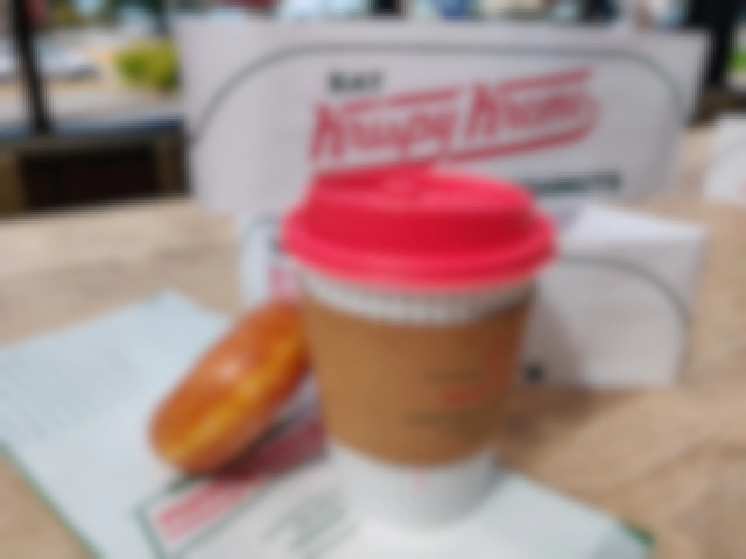 Krispy Kreme coffee and a doughnut