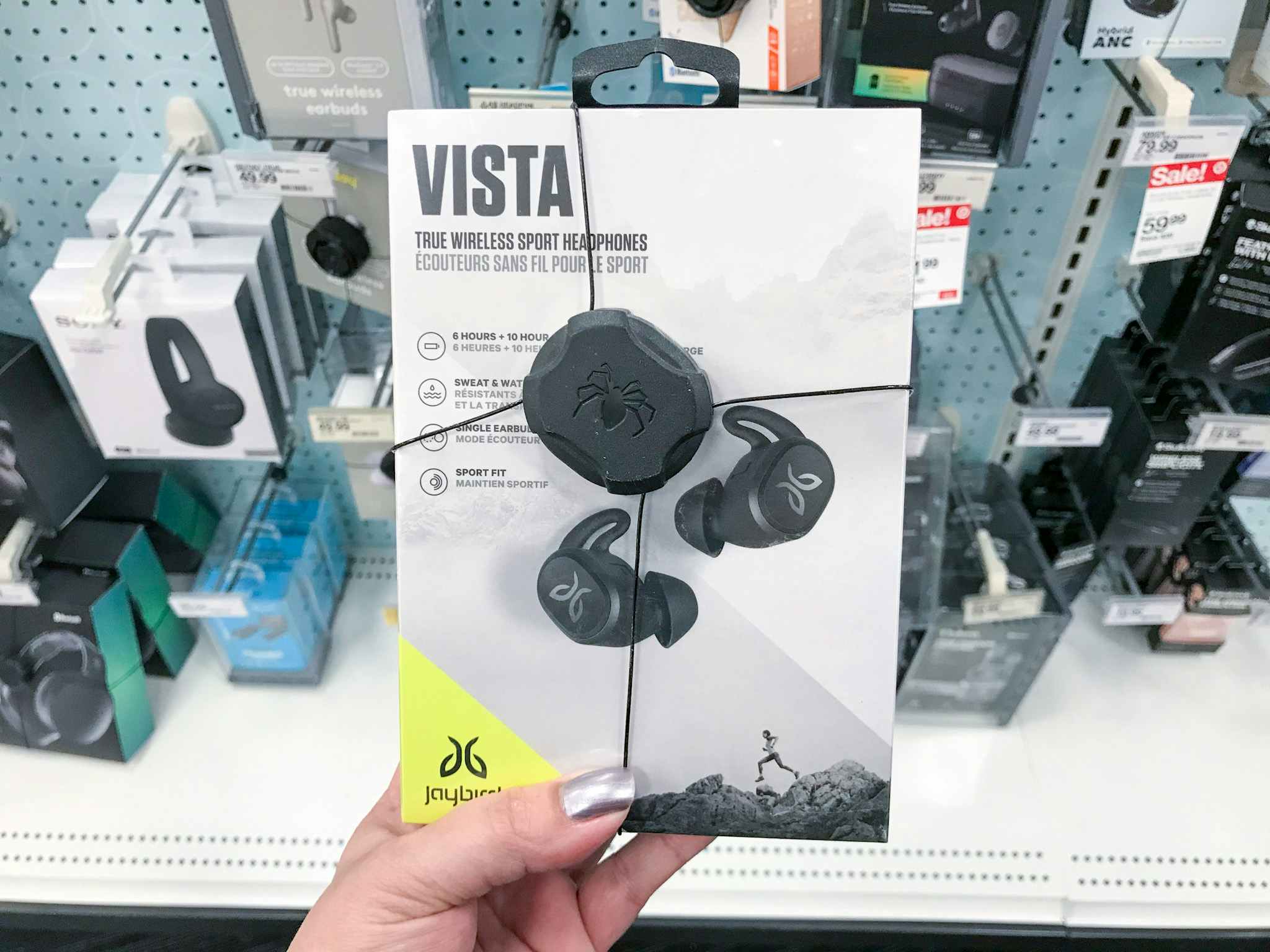 hand holding jaybird vista true wireless headphones at target