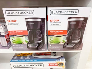 coffee maker boxes on shelf
