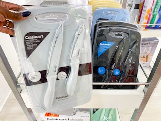 hand holding knife set