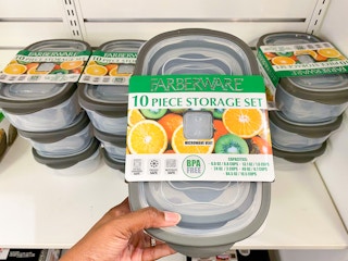 hand holding plastic food storage set