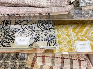 stack of indoor rugs