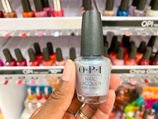 hand holding opi nail polish