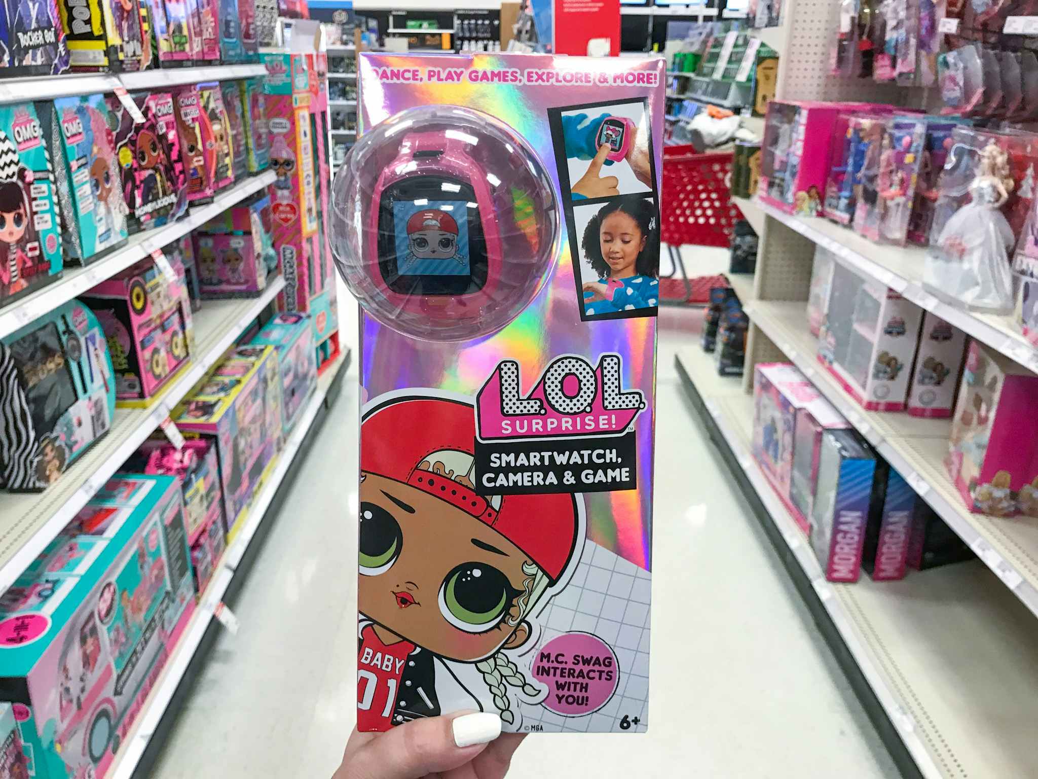 hand holding a lol surprise smartwatch at target