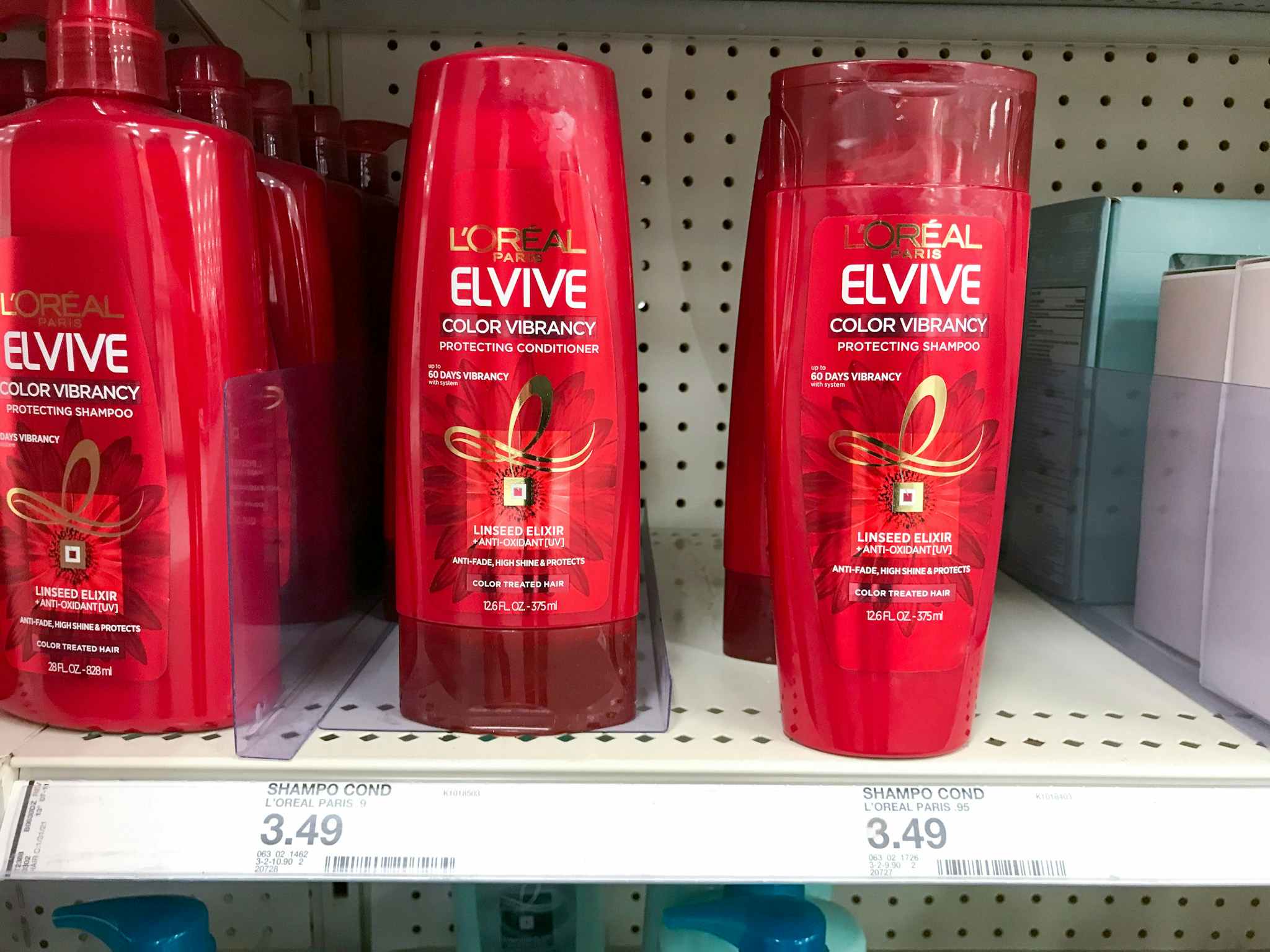 l'oreal paris elvive shampoo and conditioner in a target shelf