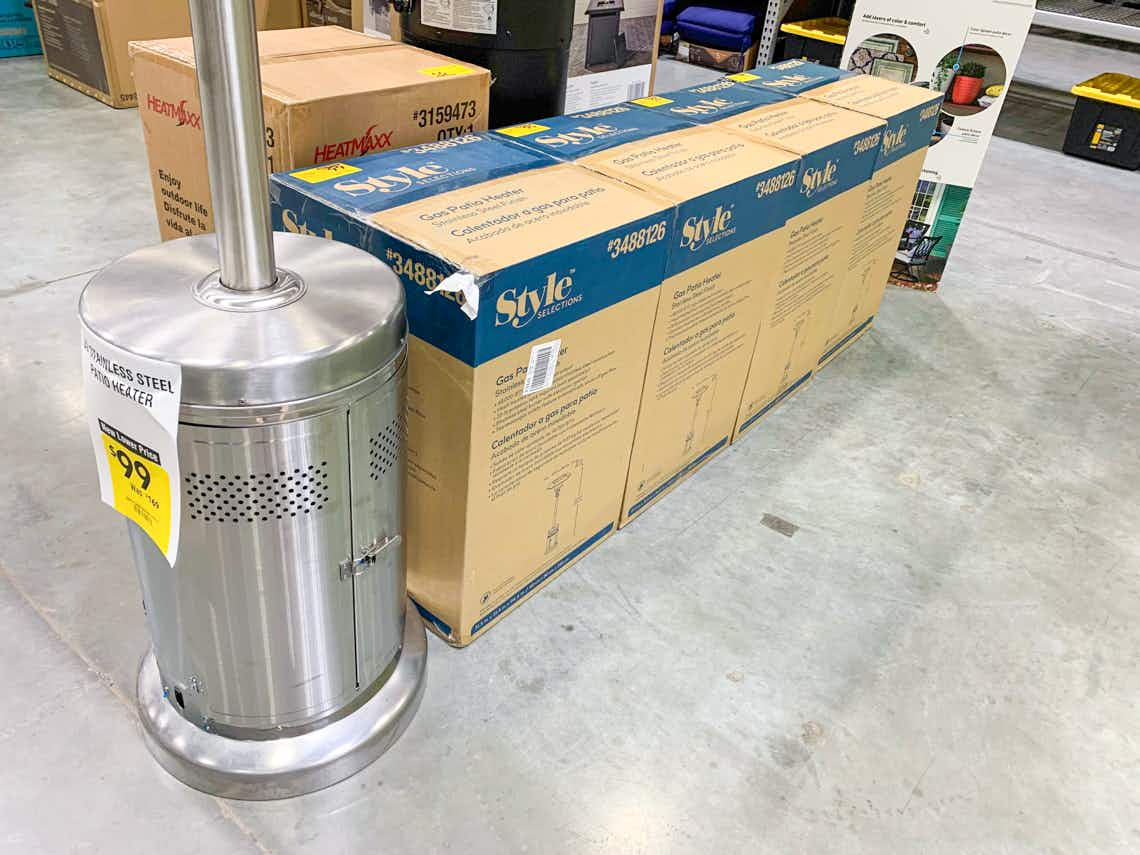 gas patio heater in boxes on lowe's store floor with clearance tags and display item