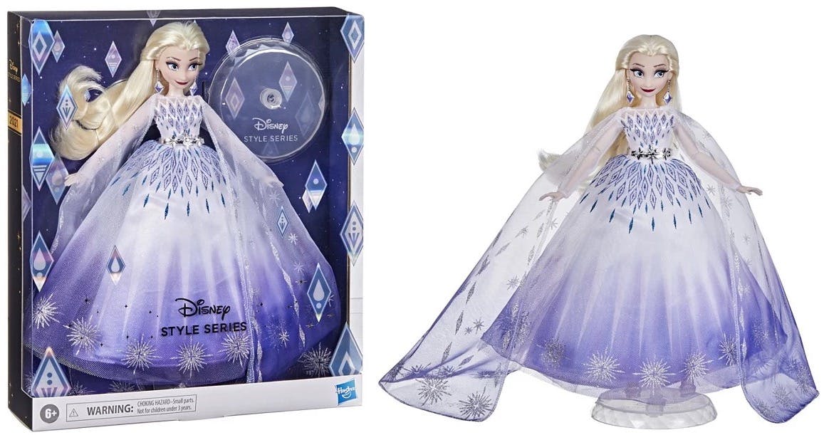 elsa doll inside holiday box and outside of the box in big holiday dress