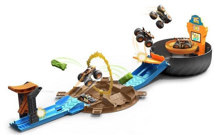stock image of Hot Wheels Monster Trucks Stunt Tire Playset with toy truck flying thru the air