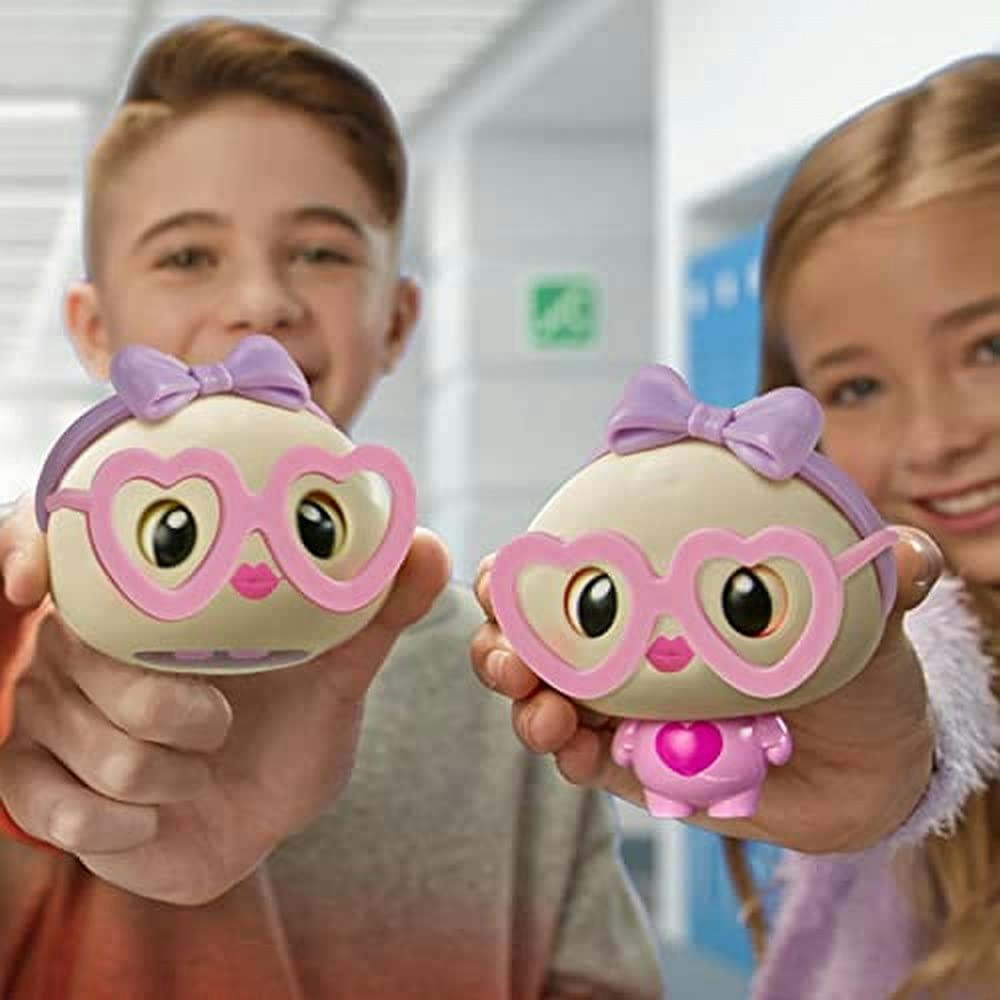 a young boy and girl holding a My Squishy Little Dumpling