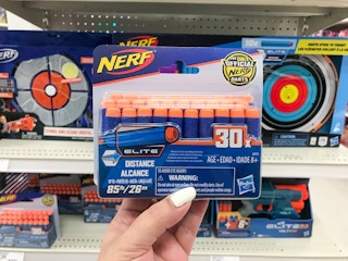 hand holding a nerf elite 30-dart refill at target