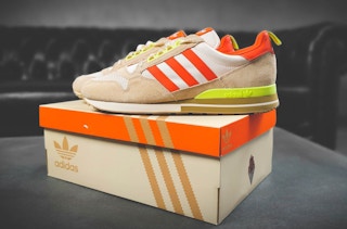 pair of adidas zx 500 jordans on top of adidas show box