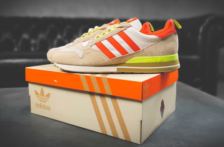 pair of adidas zx 500 jordans on top of adidas show box