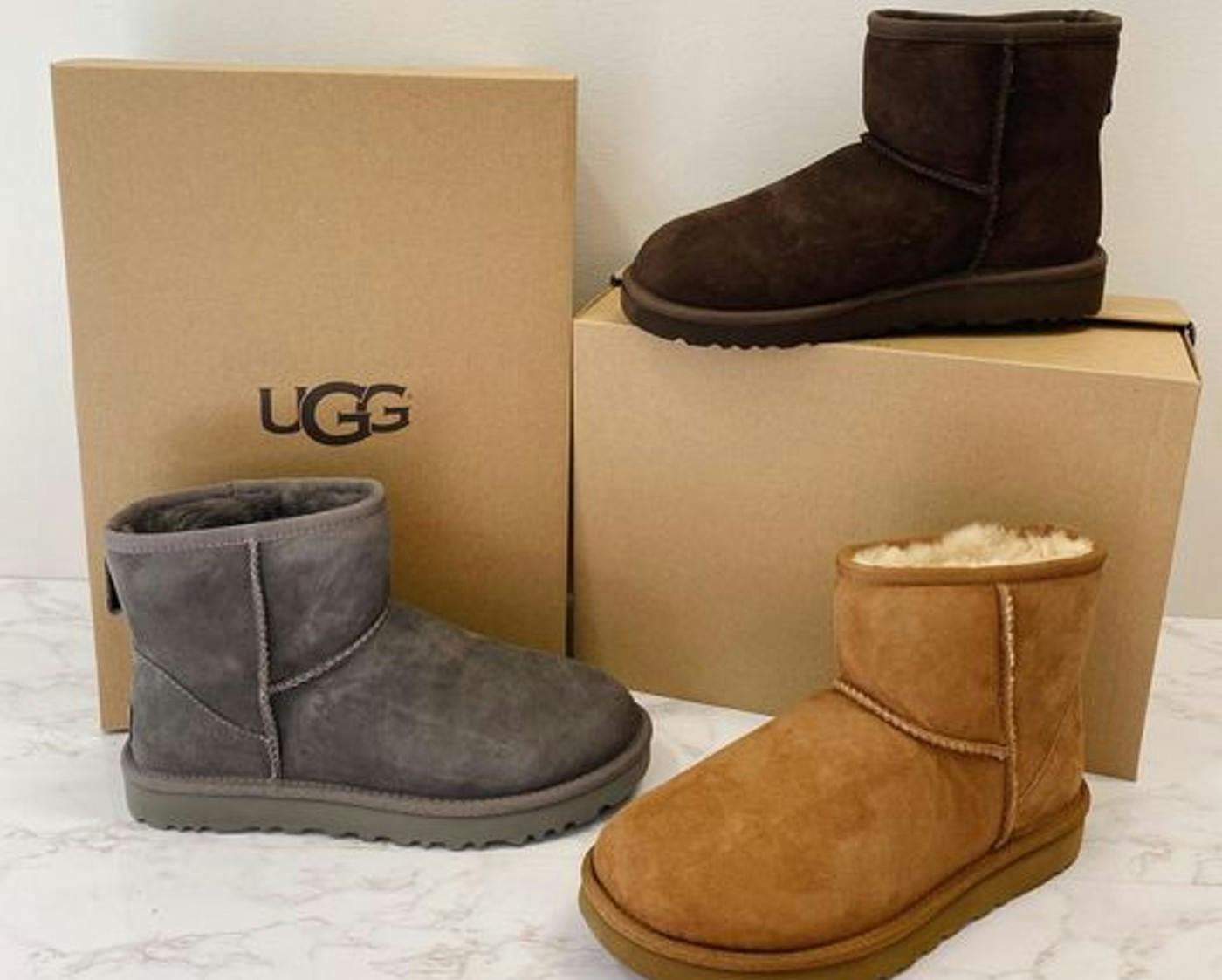 proozy low ugg boots in brown, tan, and gray with boxes