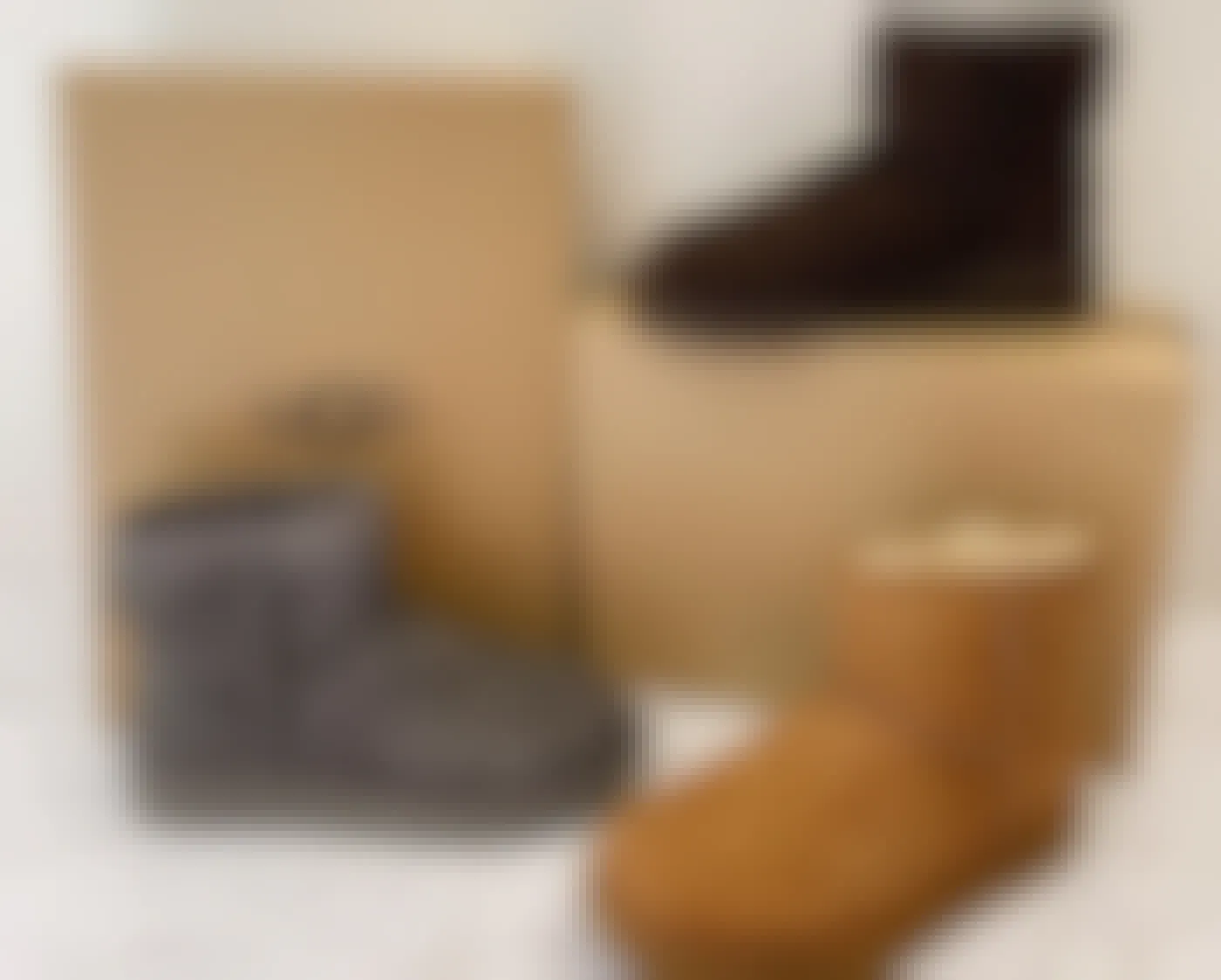 proozy low ugg boots in brown, tan, and gray with boxes