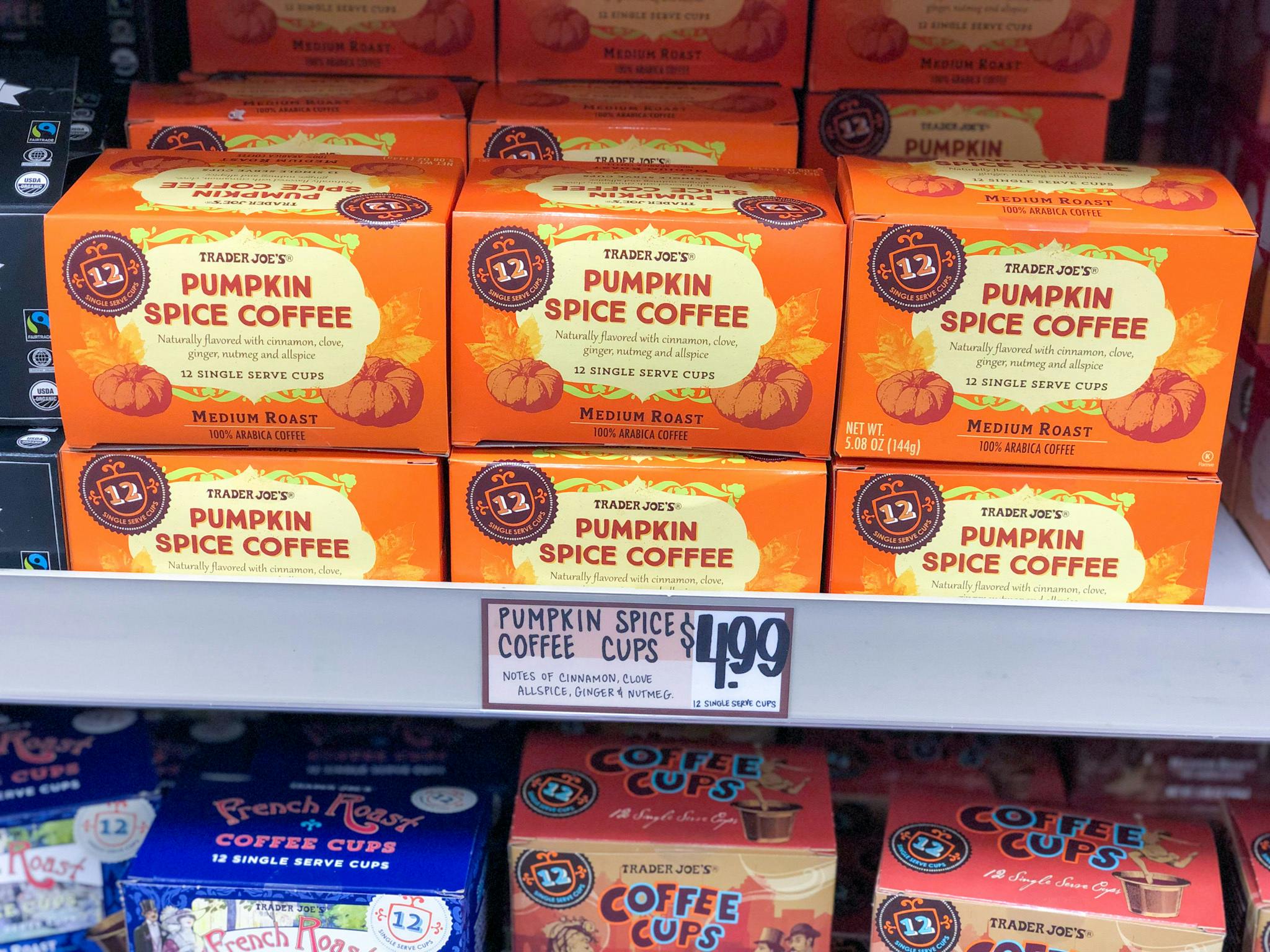 Trader Joe's pumpkin spice coffee cups on the shelf.