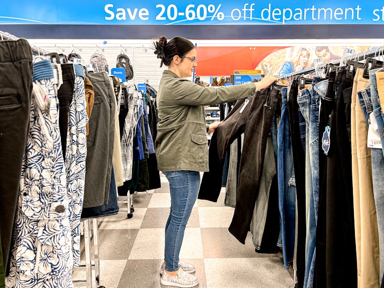a person looking at jeans at ross