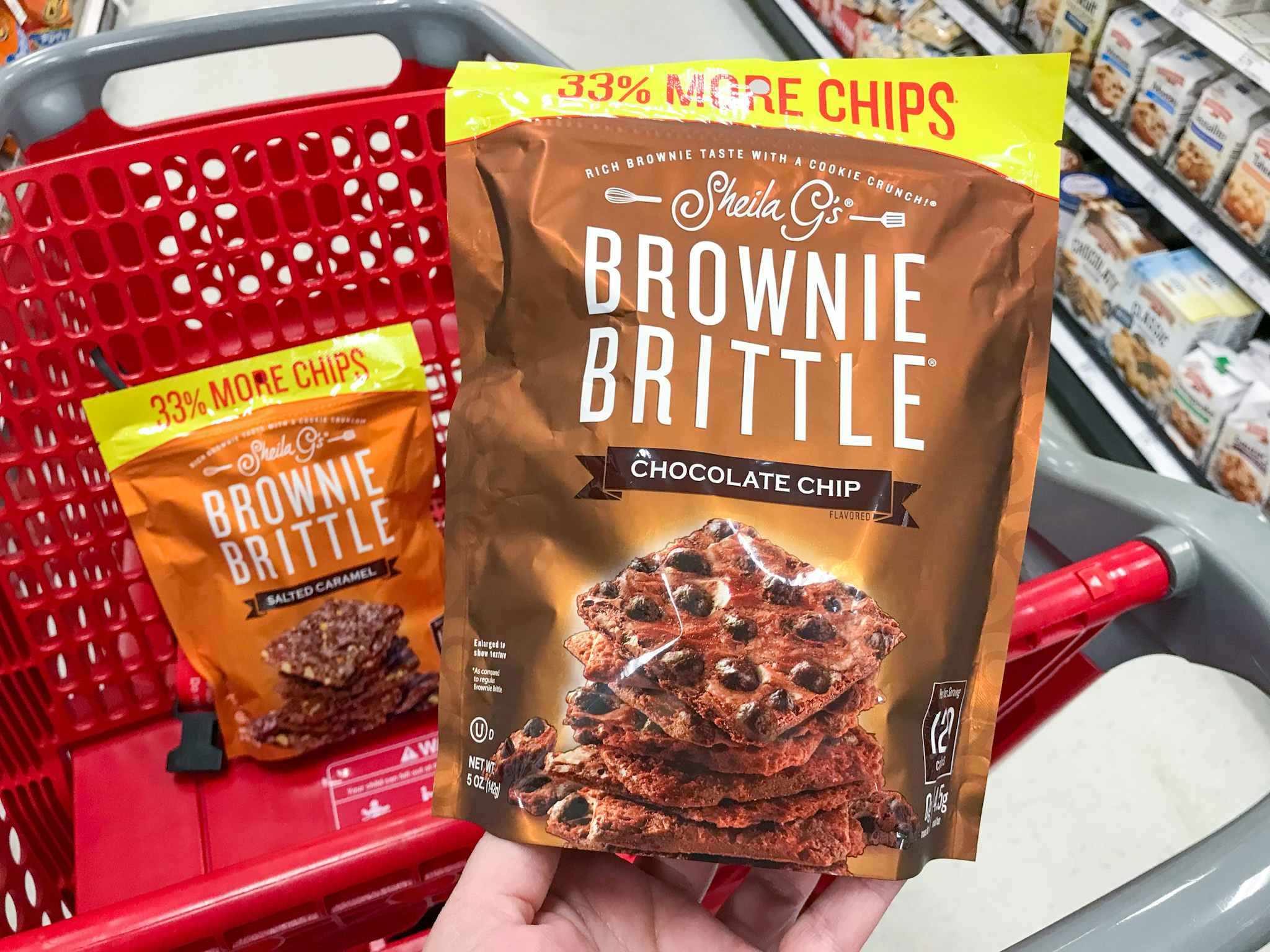 hand holding sheila g's brownie brittle at target