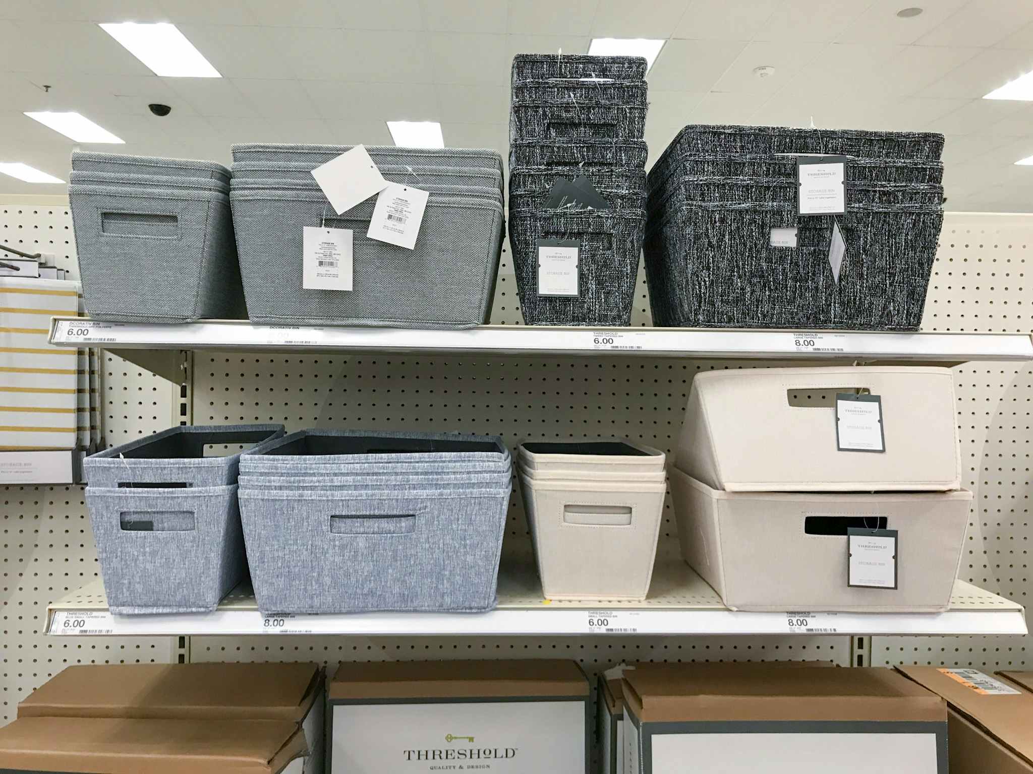 threshold tapered storage bins on a target shelf